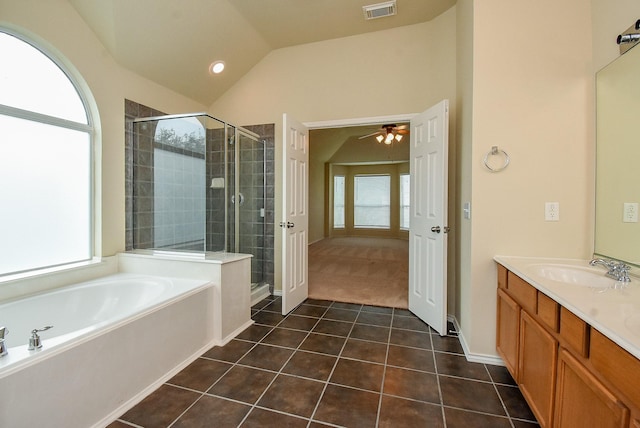 2814 Edgewick Elm St, Fresno, TX 77545 - full bathroom with a shower stall, vanity, a garden tub, lofted ceiling, and tile patterned flooring