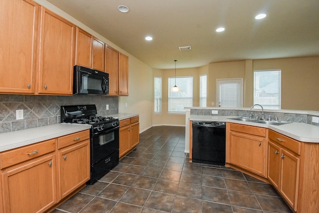 2814 Edgewick Elm St, Fresno, TX 77545 - kitchen featuring black appliances, backsplash, dark tile patterned floors, recessed lighting, and light countertops