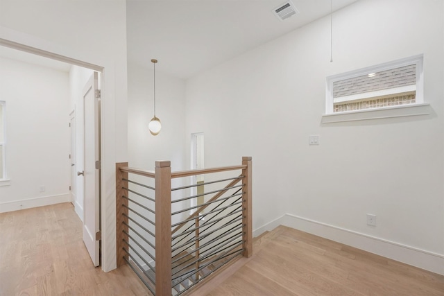 5405 Dickson St, Houston, TX 77007 - hall with an upstairs landing and light wood-style floors