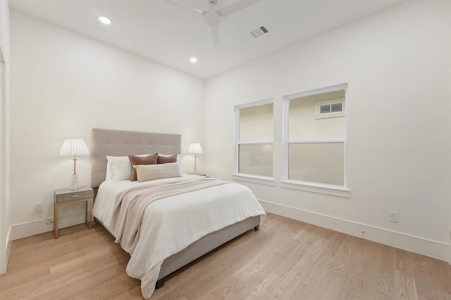 5405 Dickson St, Houston, TX 77007 - bedroom featuring light wood-style flooring, recessed lighting, and ceiling fan