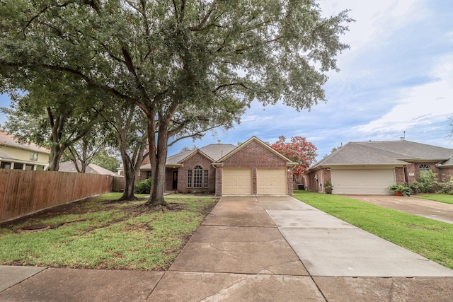 17803 Inland Oaks Dr, Richmond, TX 77407 - view of front of property featuring brick siding and a garage