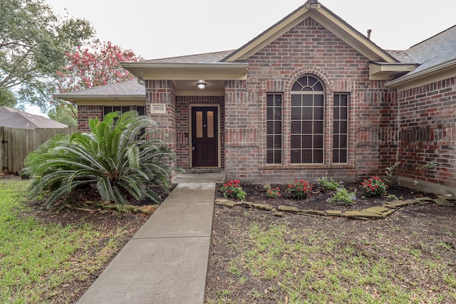 17803 Inland Oaks Dr, Richmond, TX 77407 - property entrance featuring brick siding and a shingled roof