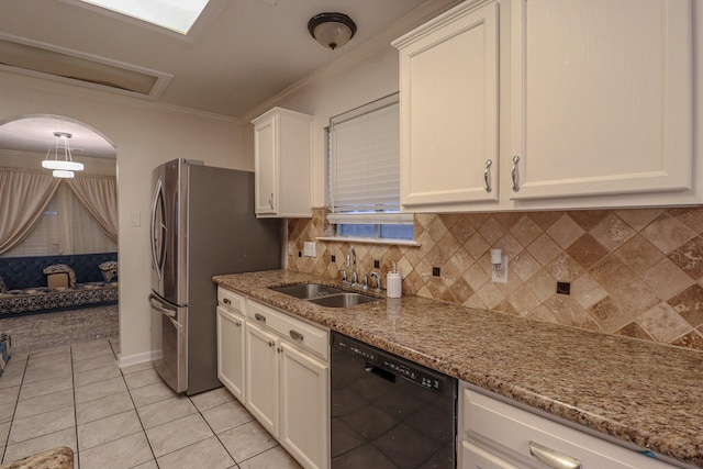 17803 Inland Oaks Dr, Richmond, TX 77407 - kitchen with black dishwasher, white cabinets, tasteful backsplash, light stone counters, and crown molding