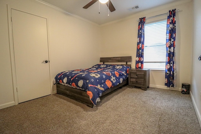 17803 Inland Oaks Dr, Richmond, TX 77407 - carpeted bedroom featuring ornamental molding and a ceiling fan