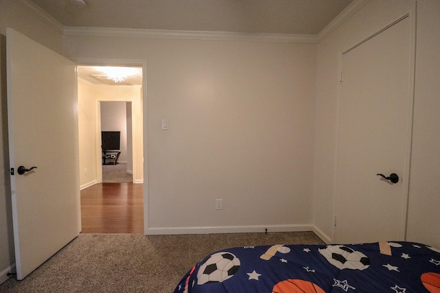 17803 Inland Oaks Dr, Richmond, TX 77407 - unfurnished bedroom featuring crown molding and carpet floors