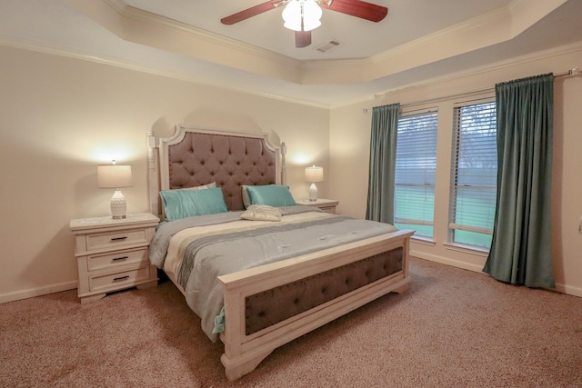 17803 Inland Oaks Dr, Richmond, TX 77407 - bedroom with a raised ceiling, light colored carpet, ornamental molding, and a ceiling fan