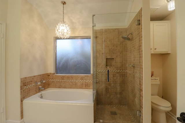 17803 Inland Oaks Dr, Richmond, TX 77407 - full bath featuring a garden tub, a shower stall, and a chandelier