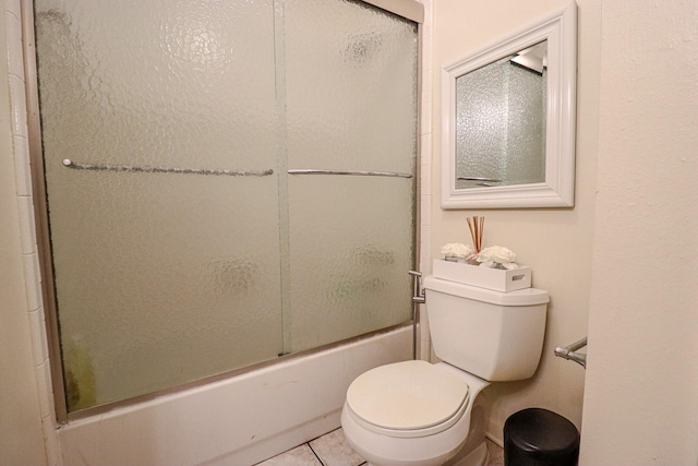 17803 Inland Oaks Dr, Richmond, TX 77407 - bathroom with tile patterned floors and bath / shower combo with glass door