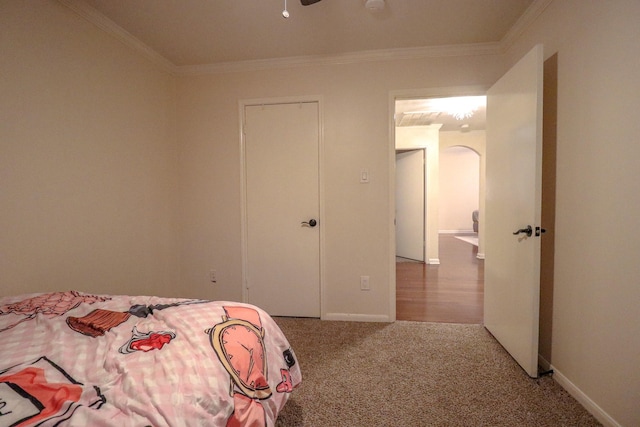 17803 Inland Oaks Dr, Richmond, TX 77407 - carpeted bedroom with ornamental molding and baseboards