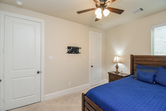 19750 Lago Terrace Loop, Richmond, TX 77407 - carpeted bedroom featuring baseboards and a ceiling fan