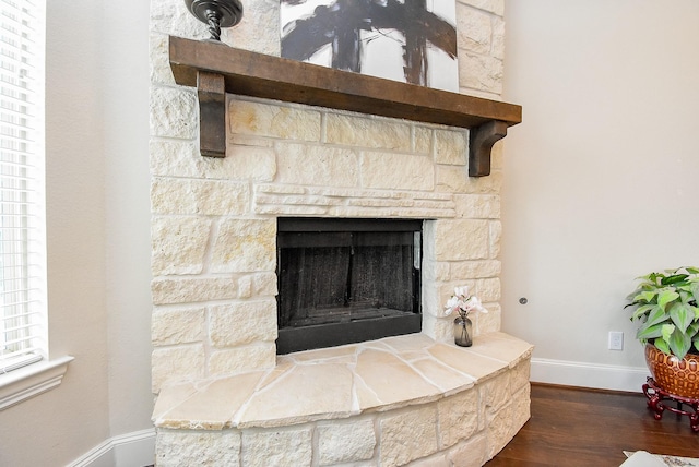 19750 Lago Terrace Loop, Richmond, TX 77407 - detailed view of wood finished floors and a fireplace