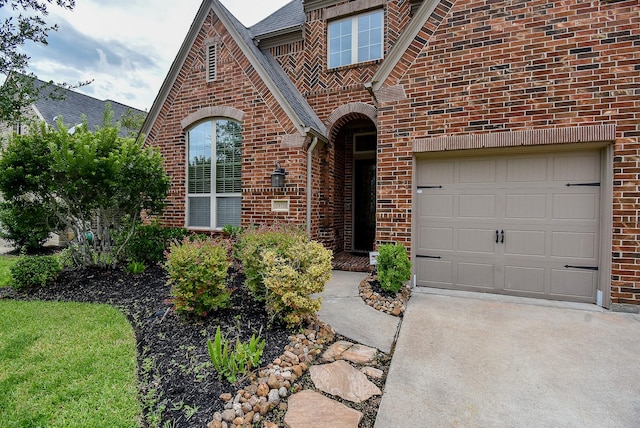 19750 Lago Terrace Loop, Richmond, TX 77407 - doorway to property featuring brick siding, concrete driveway, and roof with shingles