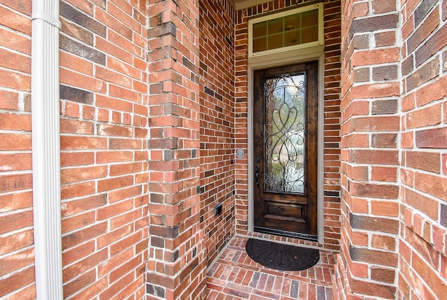 19750 Lago Terrace Loop, Richmond, TX 77407 - view of exterior entry featuring brick siding