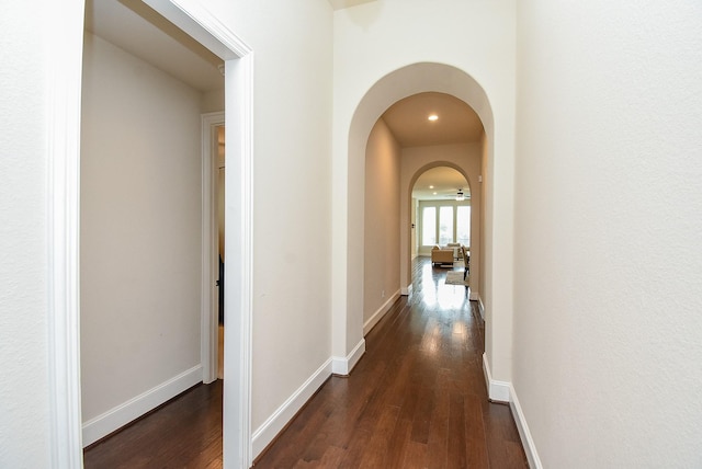 19750 Lago Terrace Loop, Richmond, TX 77407 - corridor featuring dark wood finished floors and arched walkways