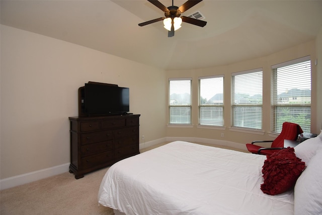 19750 Lago Terrace Loop, Richmond, TX 77407 - carpeted bedroom featuring multiple windows, lofted ceiling, and a ceiling fan