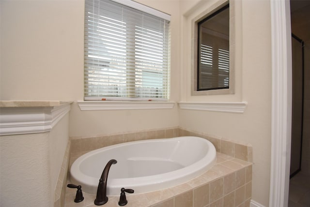 19750 Lago Terrace Loop, Richmond, TX 77407 - bathroom featuring a garden tub