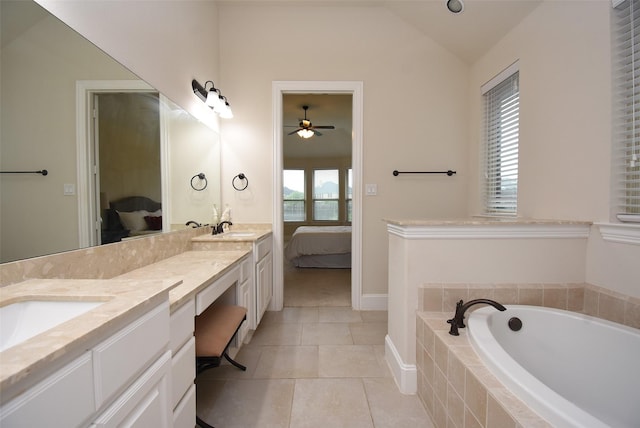 19750 Lago Terrace Loop, Richmond, TX 77407 - full bath featuring ensuite bathroom, double vanity, a bath, a ceiling fan, and vaulted ceiling