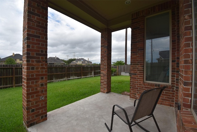 19750 Lago Terrace Loop, Richmond, TX 77407 - fenced backyard featuring a patio