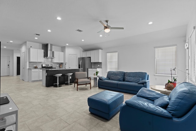 14205 Dream Rd, New Caney, TX 77357 - living area with ceiling fan and recessed lighting