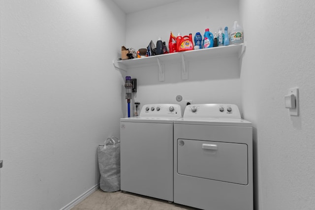 14205 Dream Rd, New Caney, TX 77357 - laundry area featuring independent washer and dryer and baseboards