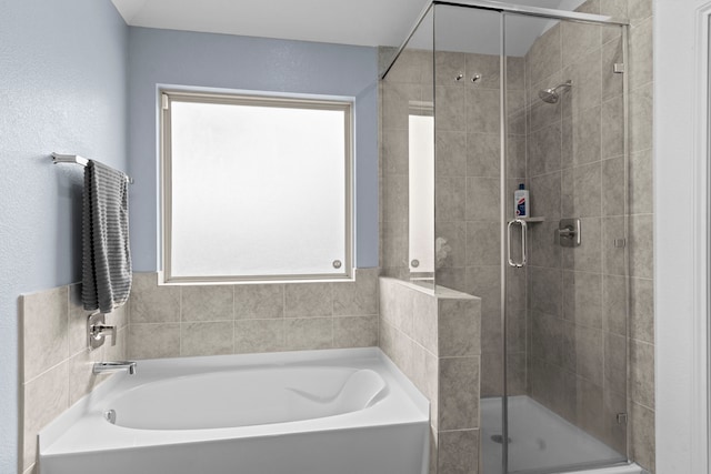 14205 Dream Rd, New Caney, TX 77357 - full bathroom with a garden tub and a stall shower