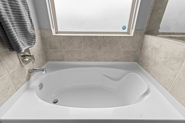 14205 Dream Rd, New Caney, TX 77357 - bathroom with a garden tub