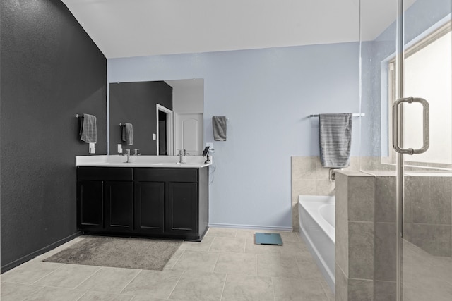 14205 Dream Rd, New Caney, TX 77357 - bathroom with a bath, double vanity, a stall shower, and tile patterned floors