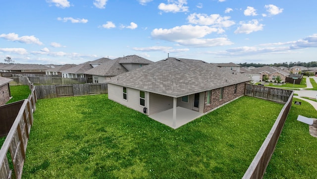 14205 Dream Rd, New Caney, TX 77357 - rear view of property with roof with shingles, a residential view, a patio, and a fenced backyard