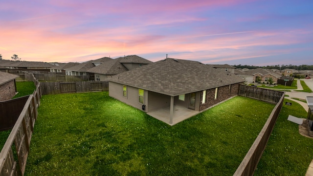 14205 Dream Rd, New Caney, TX 77357 - rear view of property with roof with shingles, a residential view, a patio, and a fenced backyard