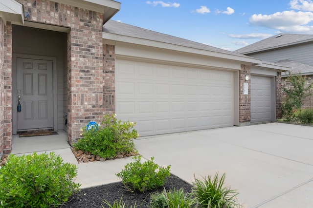 14205 Dream Rd, New Caney, TX 77357 - garage featuring driveway