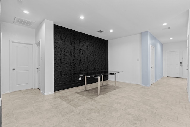 14205 Dream Rd, New Caney, TX 77357 - unfurnished room featuring recessed lighting and an accent wall