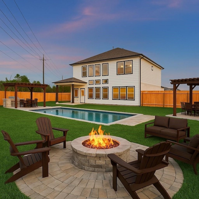 390 Kendall Crest Dr, Alvin, TX 77511 - rear view of house with a pergola, a gazebo, a patio area, and a fenced backyard