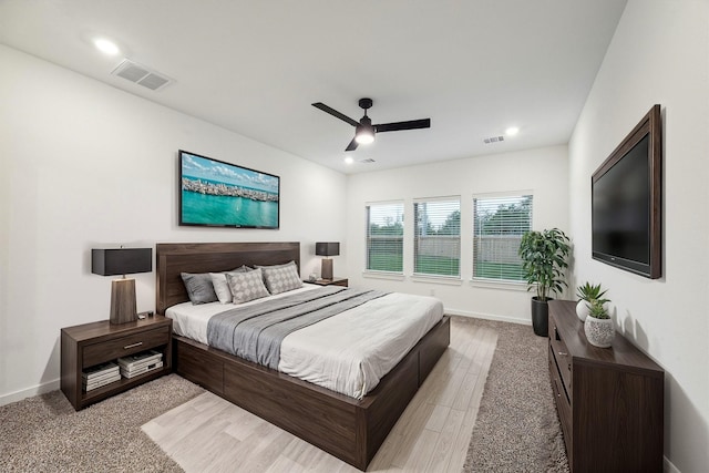 390 Kendall Crest Dr, Alvin, TX 77511 - bedroom with light colored carpet, a ceiling fan, and recessed lighting