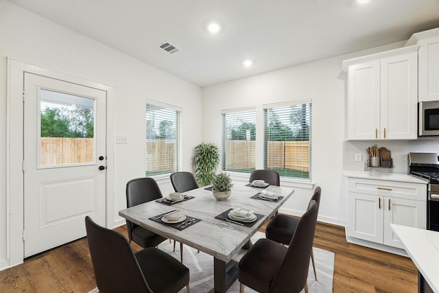390 Kendall Crest Dr, Alvin, TX 77511 - dining room featuring dark wood finished floors and recessed lighting