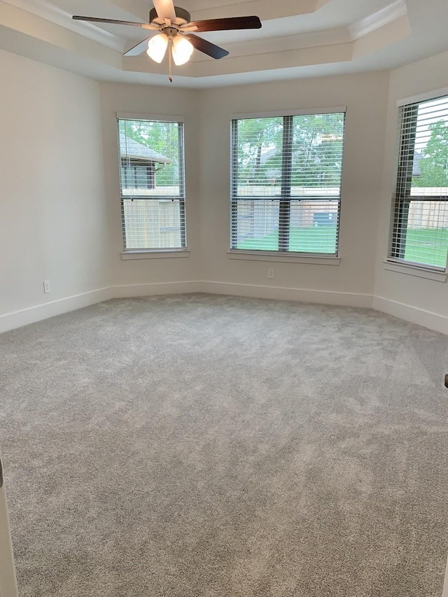 12515 Tullich Run Dr, Humble, TX 77346 - carpeted empty room with a raised ceiling and a ceiling fan