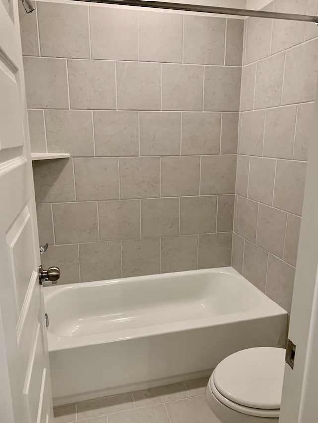 12515 Tullich Run Dr, Humble, TX 77346 - bathroom with tub / shower combination and tile patterned flooring