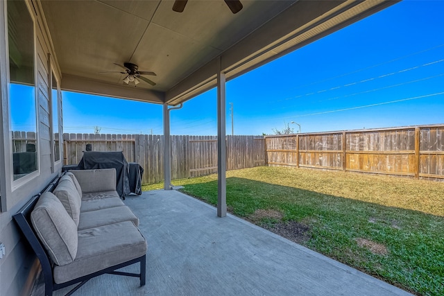 18623 Swainboro Dr, New Caney, TX 77357 - fenced backyard featuring ceiling fan and a patio