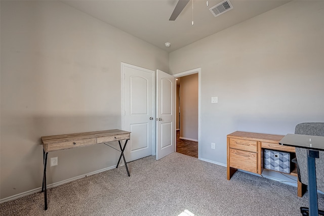 18623 Swainboro Dr, New Caney, TX 77357 - home office featuring a ceiling fan and carpet floors