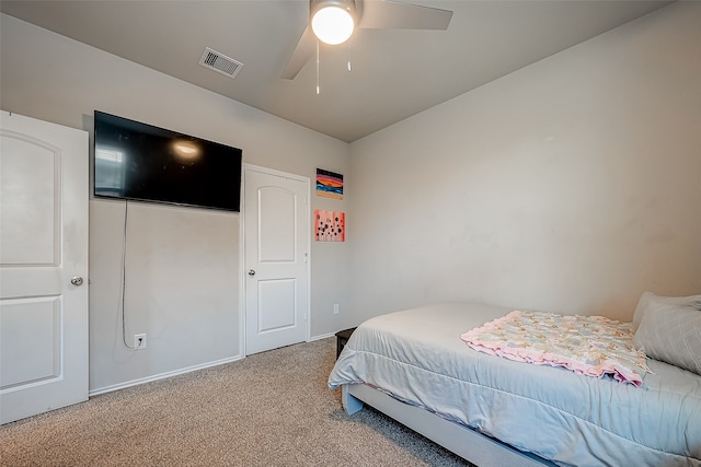18623 Swainboro Dr, New Caney, TX 77357 - bedroom with carpet floors and a ceiling fan