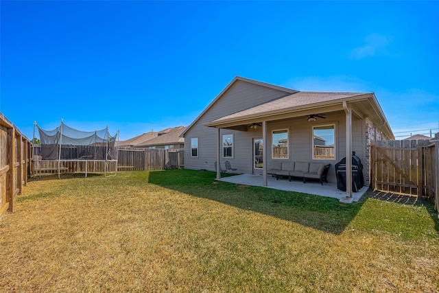 18623 Swainboro Dr, New Caney, TX 77357 - back of house with ceiling fan, a patio area, and a fenced backyard