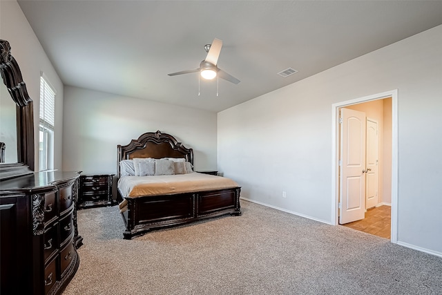 18623 Swainboro Dr, New Caney, TX 77357 - bedroom featuring light colored carpet and a ceiling fan