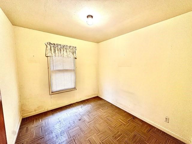 515 Vaky St, Corpus Christi, TX 78404 - spare room featuring baseboards