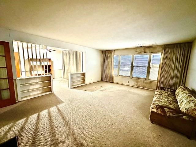 515 Vaky St, Corpus Christi, TX 78404 - unfurnished living room with carpet flooring