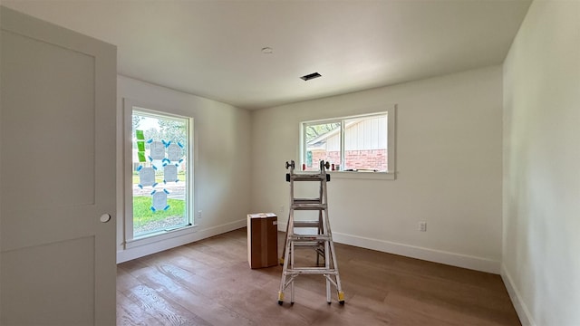 10047 Meadow Lake Ln, Houston, TX 77042 - exercise area featuring plenty of natural light and wood finished floors