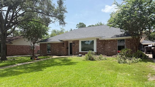 10047 Meadow Lake Ln, Houston, TX 77042 - single story home featuring brick siding, a front lawn, and a shingled roof