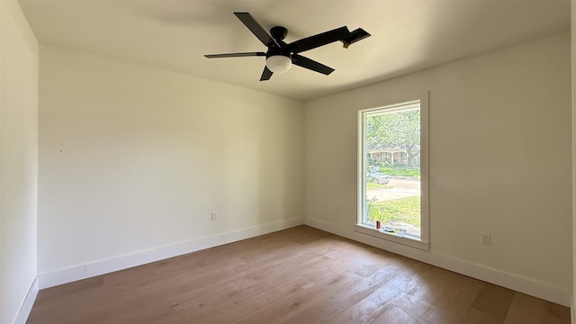 10047 Meadow Lake Ln, Houston, TX 77042 - unfurnished room featuring wood finished floors and a ceiling fan