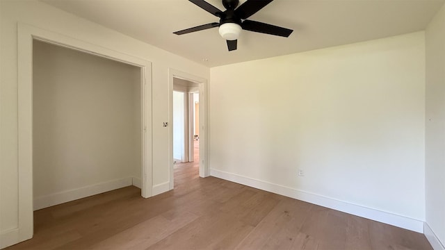 10047 Meadow Lake Ln, Houston, TX 77042 - unfurnished bedroom with wood finished floors and a ceiling fan