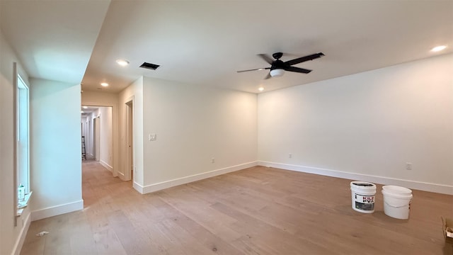 10047 Meadow Lake Ln, Houston, TX 77042 - empty room with a ceiling fan, light wood finished floors, and recessed lighting