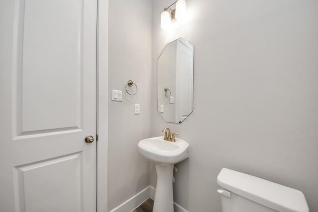 9016 Lonestar River Ln, Houston, TX 77080 - bathroom with toilet and a sink