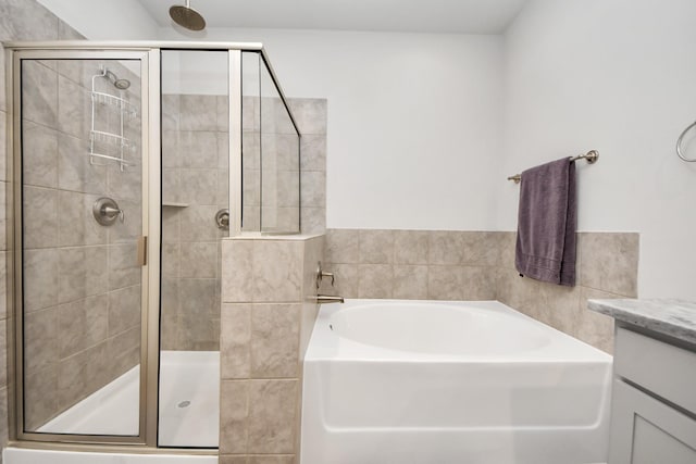 9016 Lonestar River Ln, Houston, TX 77080 - full bath featuring a garden tub, a stall shower, and vanity